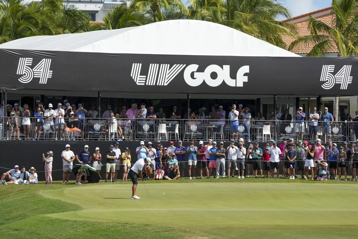 In this Oct 30, 2022 photo, team captain Brooks Koepka of Smash GC putts on the 18th green during the team championship stroke-play round of the LIV Golf Invitational - Miami at Trump National Doral Miami.

