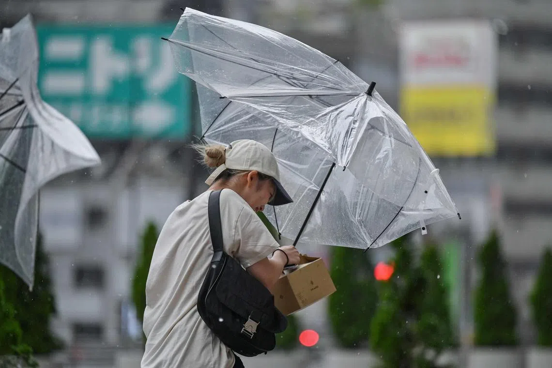 Located about 170km south of Tokyo, Ampil was packing gusts of up to 216 kmh as it headed north-east.