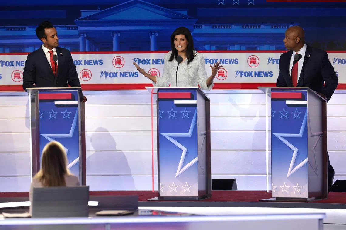 (From left) Mr Vivek Ramaswamy, former South Carolina Governor Nikki Haley, and US Senator TIm Scott in the first debate of the GOP primary season on Aug 23.