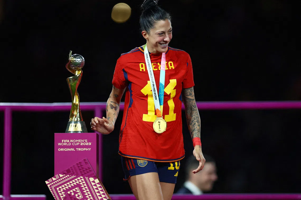 FILE PHOTO: Soccer Football - FIFA Women's World Cup Australia and New Zealand 2023 - Final - Spain v England - Stadium Australia, Sydney, Australia - August 20, 2023 Spain's Jennifer Hermoso celebrates with the trophy after winning the world cup REUTERS/Hannah Mckay/File Photo