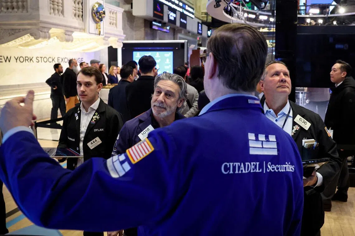 Wall St ends lower as tech rally stalls, AI fervor wanes after Nvidia results