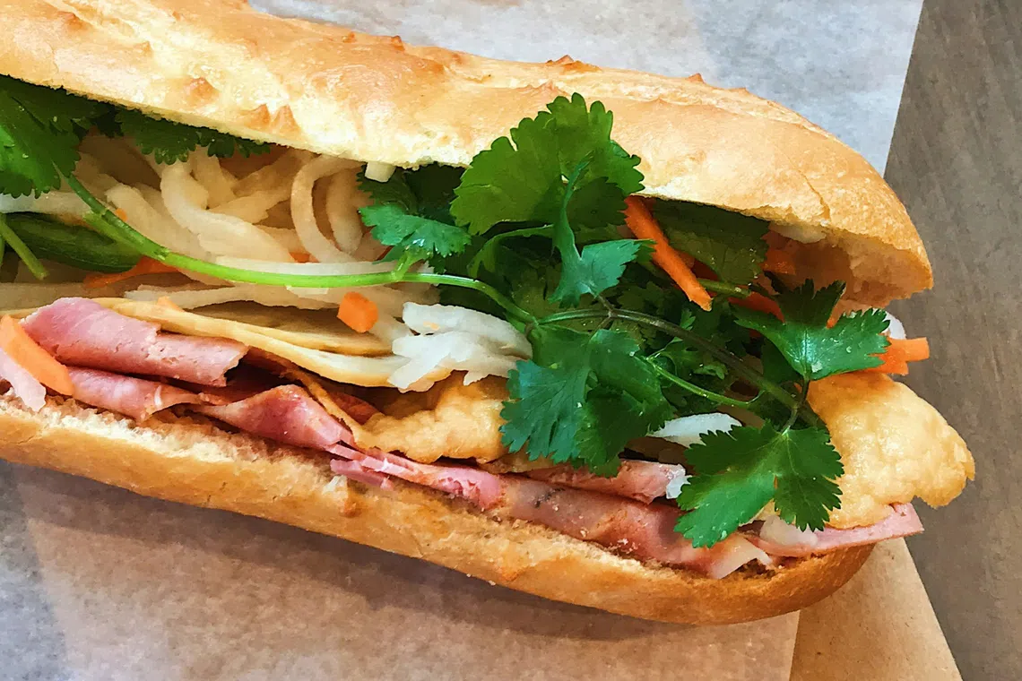 Over 200 suspected food poisoning cases linked to two banh mi outlets in Ho Chi Minh City