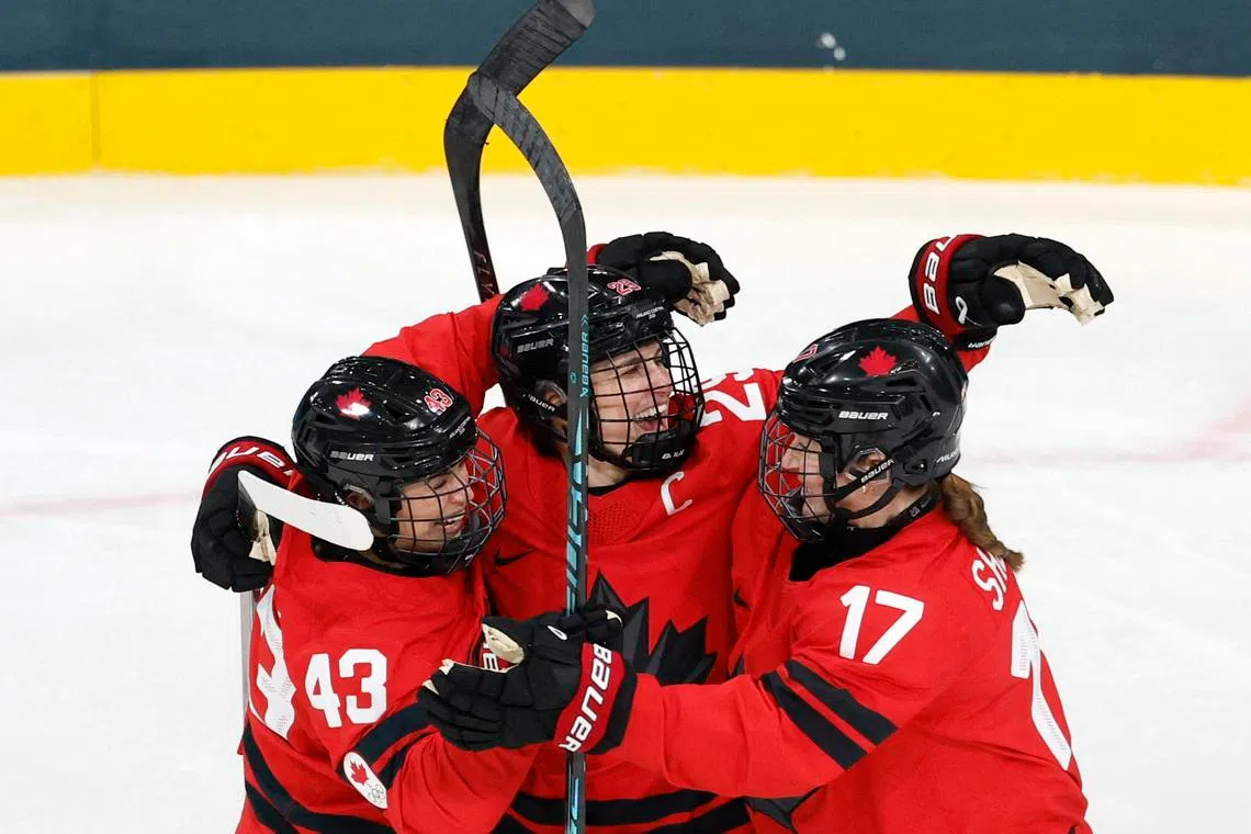 Ice hockey-Canada's game with Czechs overshadowed by Poulin injury worry