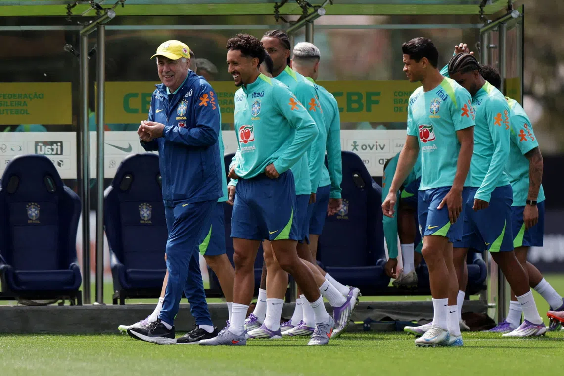 Soccer Football - World Cup - CONMEBOL Qualifiers - Brazil Press Conference and Training - Granja Comary, Teresopolis, Brazil - September 8, 2025 Brazil players with coach Carlo Ancelotti during training REUTERS/Ricardo Moraes