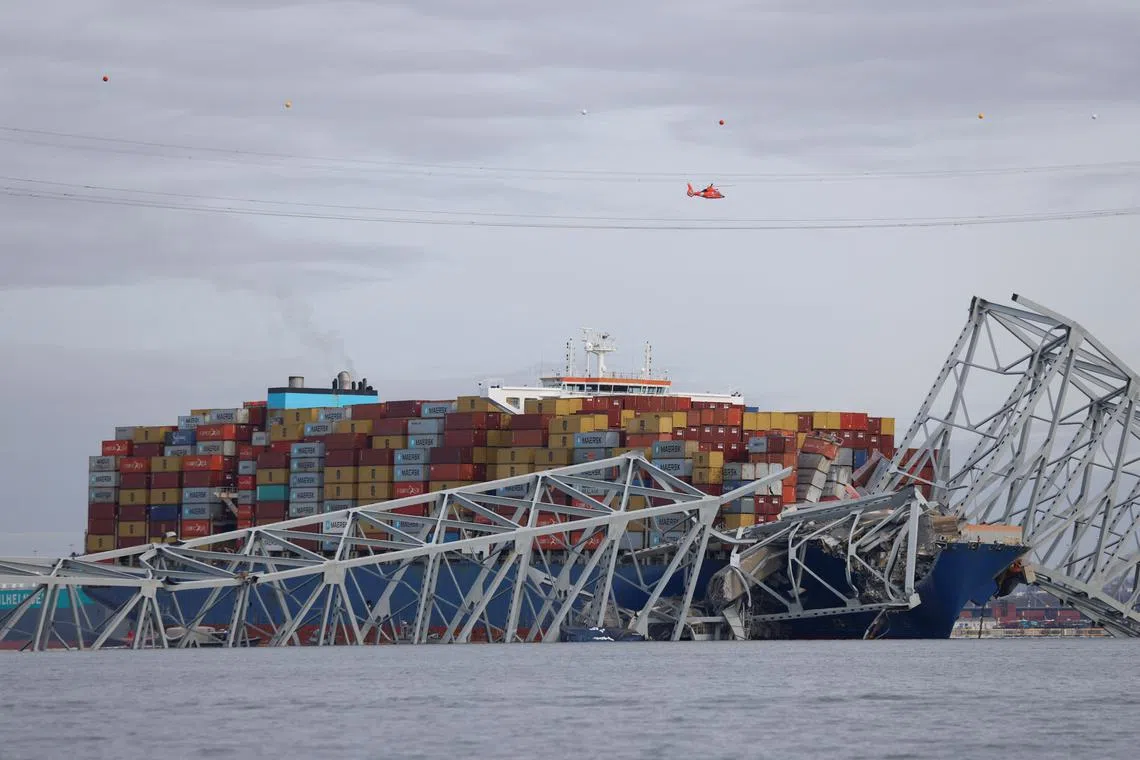 A view of the Dali cargo vessel which crashed into the Francis Scott Key Bridge causing it to collapse in Baltimore, Maryland, U.S., March 26, 2024.  REUTERS/Julia Nikhinson
