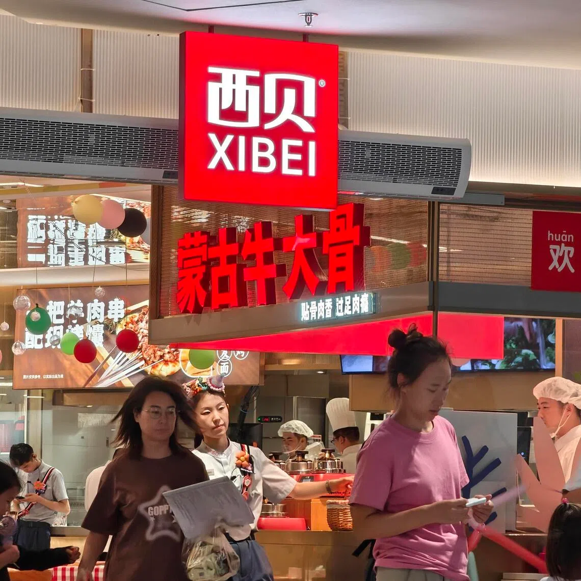 BEIJING, CHINA - SEPTEMBER 14: Exterior view of Xibei restaurant on September 14, 2025 in Beijing, China. The dispute between internet celebrity Luo Yonghao and the well-known Chinese restaurant chain Xibei has sparked heated discussions across China's internet over the transparency and definition of pre-made dishes. 
(Photo by Su Weizhong/VCG via Getty Images)