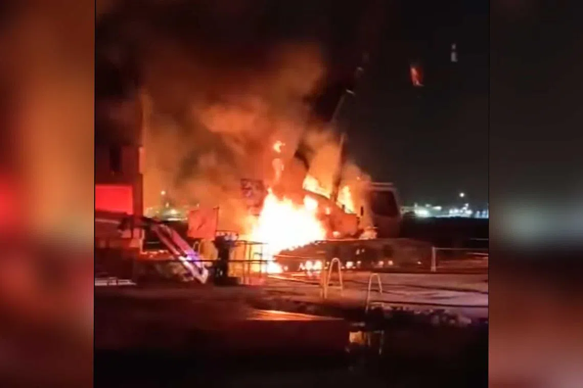 A video uploaded on Facebook shows a crane truck engulfed in flames.