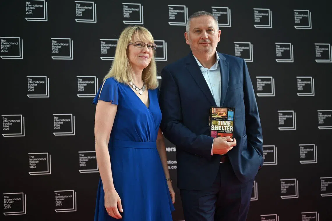The S$83,649 prize is split equally between Bulgarian author Georgi Gospodinov (right) and US literary translator Angela Rodel.