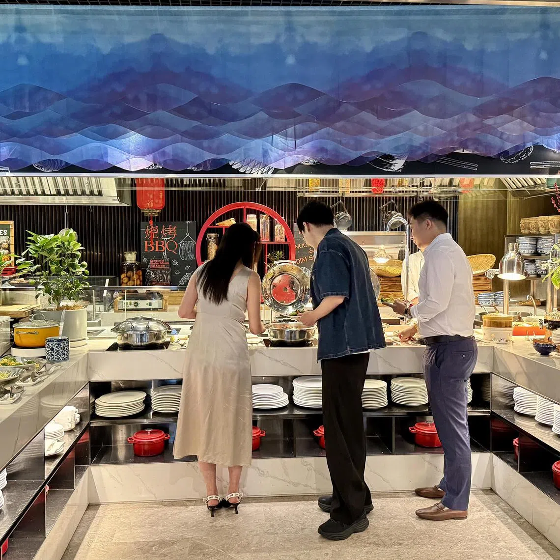 Wealthy single Chinese mingle at a high-end matchmaking event for China's wealthy singles in Beijing on July 13, 2025.