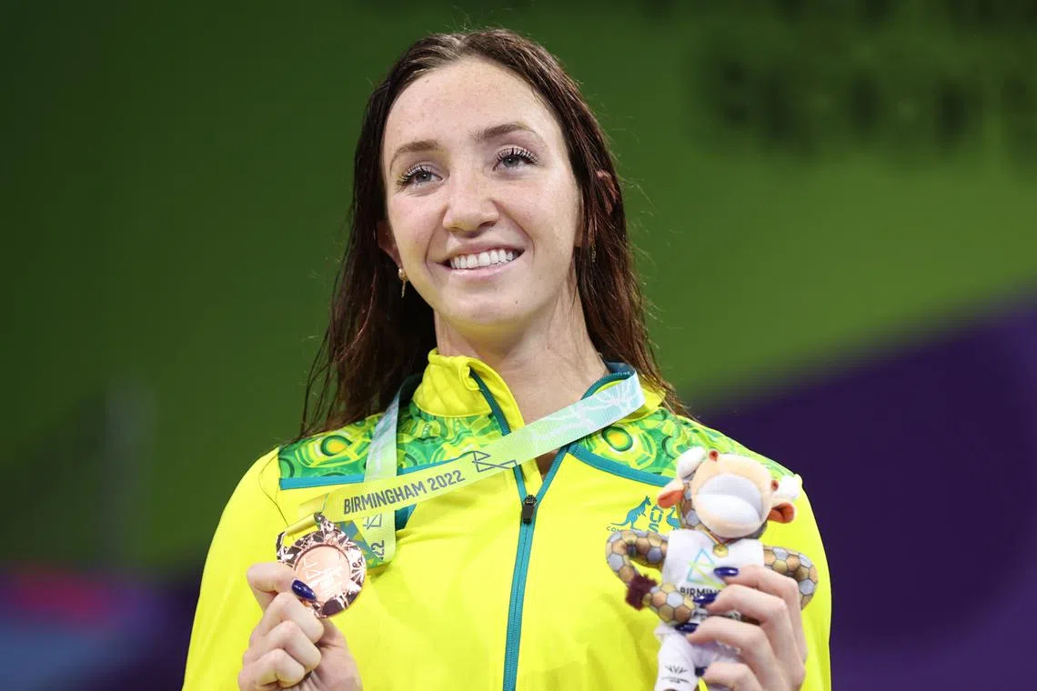 FILE PHOTO: Commonwealth Games - Swimming - Women's 800m Freestyle - Medal Ceremony - Sandwell Aquatics Centre, Birmingham, Britain - August 2, 2022 Bronze medallist Australia's Lani Pallister celebrates on the podium during the medal ceremony REUTERS/Stoyan Nenov/File Photo