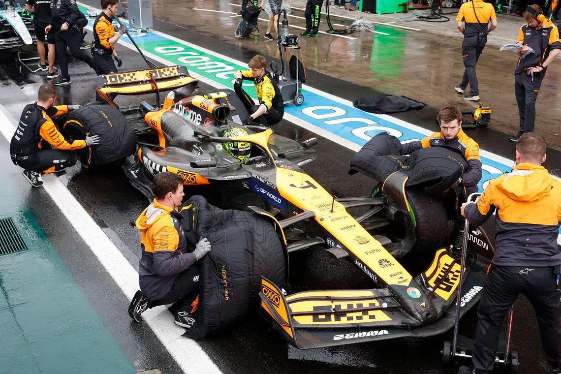 McLaren's Lando Norris pits during a red flag in the Sao Paulo Grand Prix.
