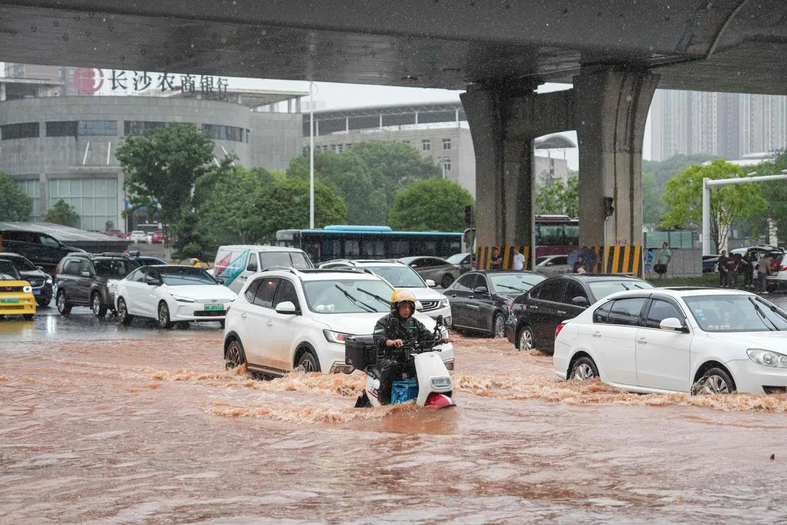 China has been enduring extreme weather conditions in recent months, from torrential rainfall to searing heat waves.