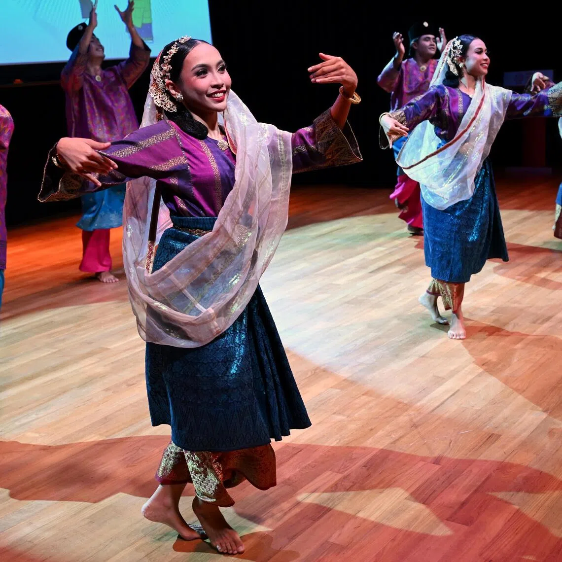 Zapin practitioners giving a demonstration of the dance at the Malay Heritage Centre on Sept 24.