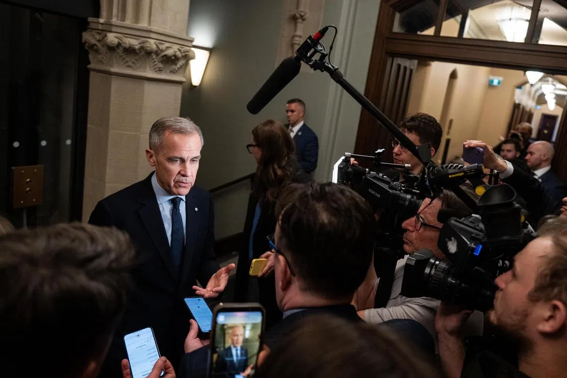 epa11954216 Liberal Party of Canada Leader Mark Carney speaks to reporters following a Liberal Party caucus in the House of Commons in Ottawa, Canada, 10 March 2025.  EPA-EFE/SPENCER COLBY