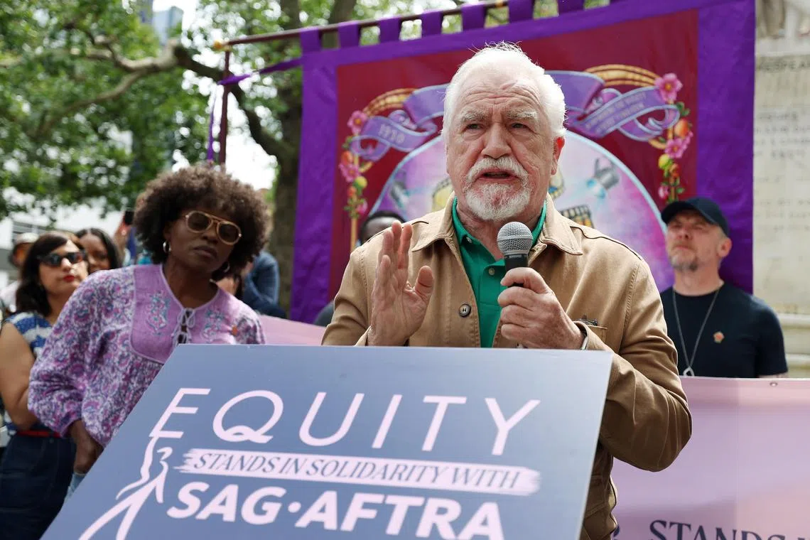 epa10760010 Scottish actor Brian Cox speaks to Equity union members during a British actors' rally at the Leicester Square in London, Britain, 21 July 2023. Members of the actors union Equity held rallies in Britain in solidarity with their SAG-AFTRA members currently on strike in the United States.  EPA-EFE/ANDY RAIN