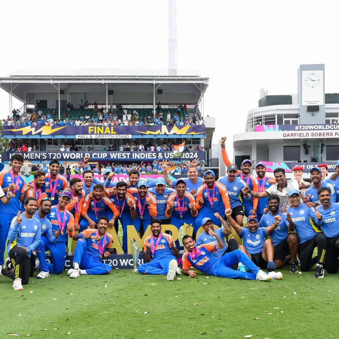 India celebrate after beating South Africa by seven runs to win the ICC men's Twenty20 World Cup final at Kensington Oval in Bridgetown, Barbados, on June 29, 2024.