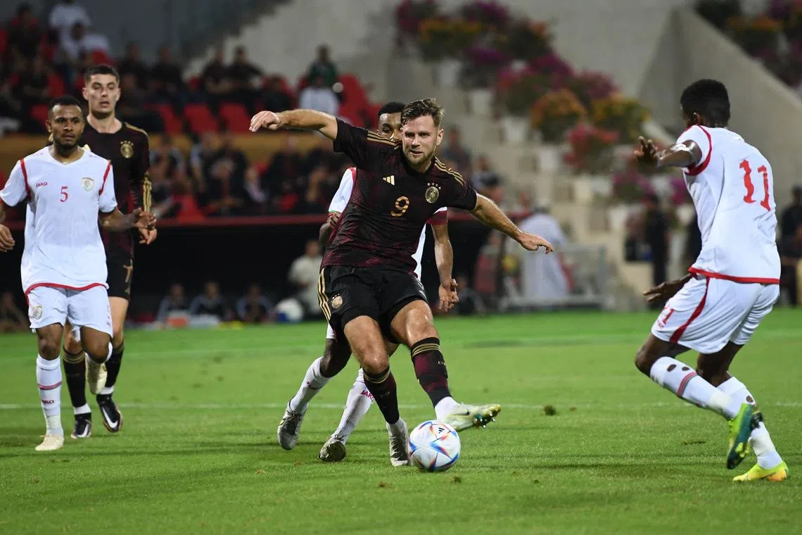 Nicklas Fullkrug scoring Germany's only goal as they eked out a 1-0 win over a well-drilled Oman in a friend as the Sultan Qaboos Sports Complex in Muscat on Thursday. 