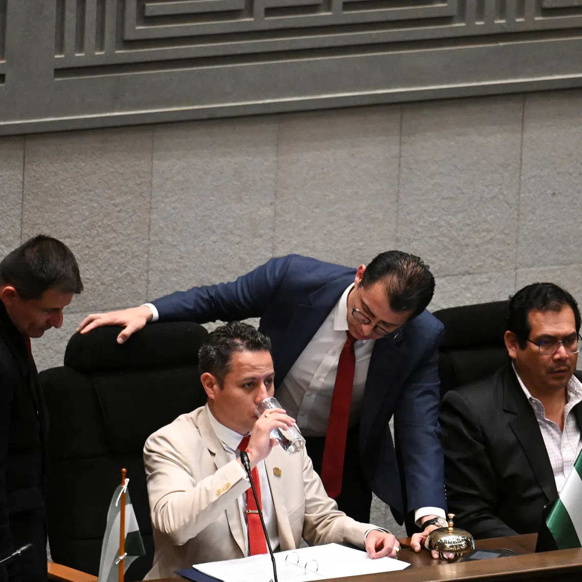 Bolivia's Vice President and President of the Plurinational Legislative Assembly Edmand Lara, drinks water while presiding over a session of the Plurinational Legislative Assembly, where the extension of the state of emergency for 90 days is being discussed, in La Paz, Bolivia, September 16, 2026. REUTERS/Claudia Morales