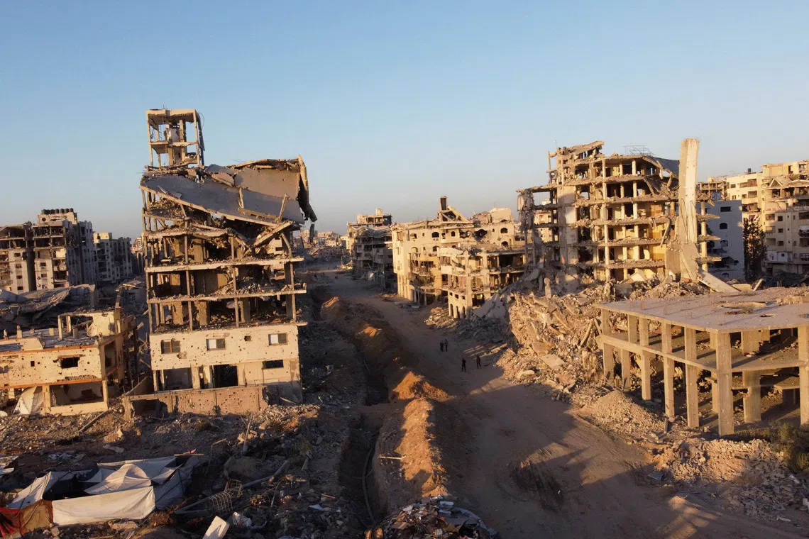 A drone view shows the destruction in a residential neighborhood, after the withdrawal of the Israeli forces from the area, amid a ceasefire between Israel and Hamas in Gaza, in Gaza City. REUTERS/Dawoud Abu Alkas
