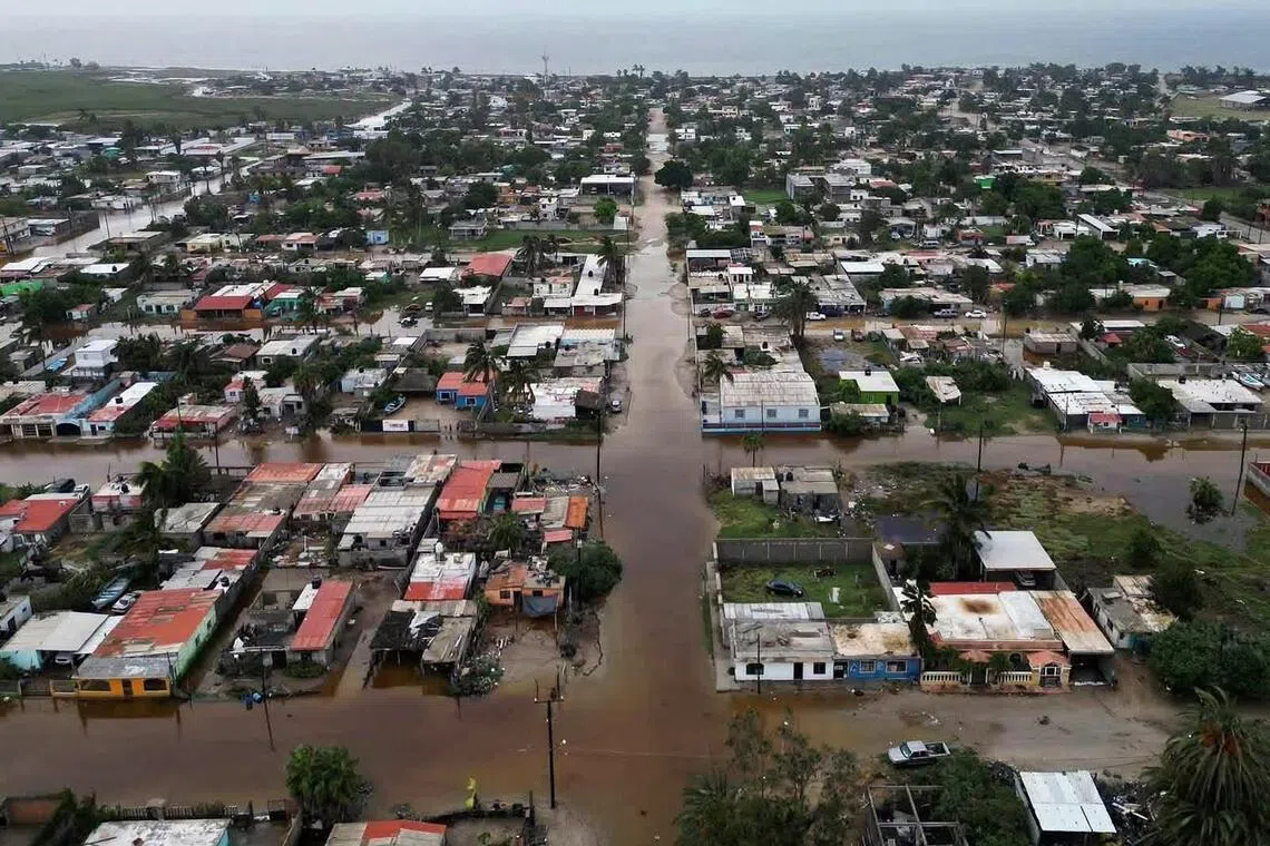 Hurricane Polo sweeps over Mexico’s Pacific coast, heads inland