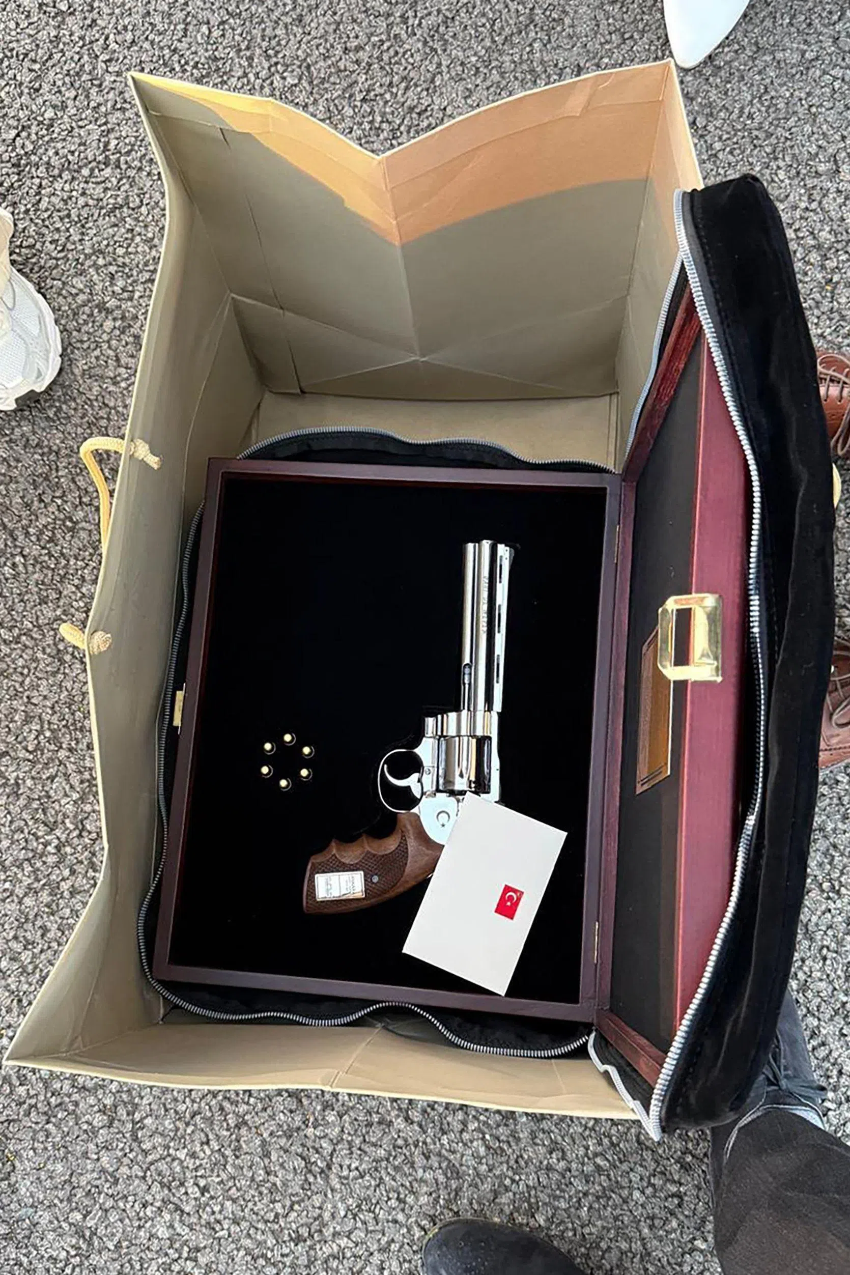 A photo from the Belgian prime minister’s press office showing the  revolver gifted to him by Turkish President Recep Tayyip Erdogan.