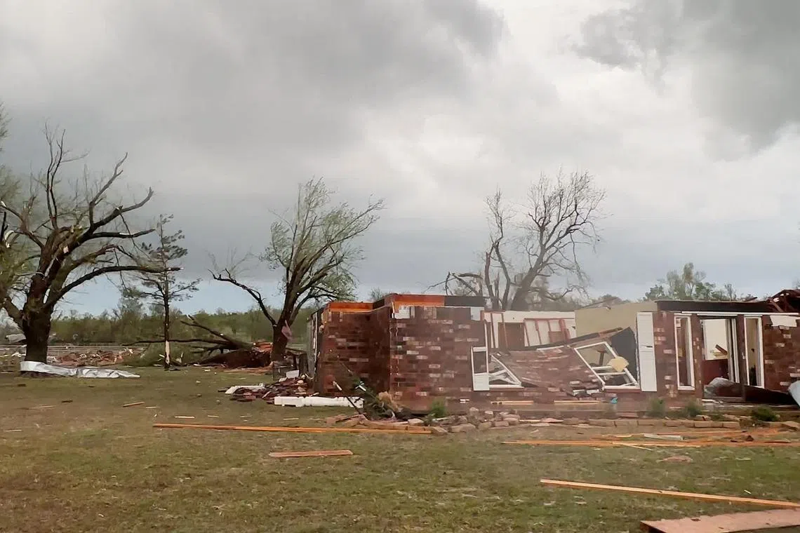 Damaged buildings in Cole, Oklahoma, after a tornado hit the area on April 19.