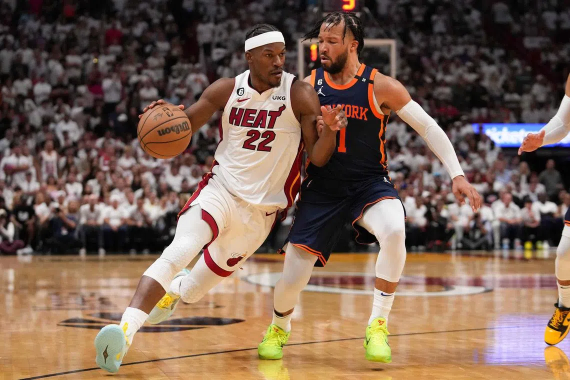 Jimmy Butler (left) scored 28 points to lead the Miami Heat to a 105-86 win over the New York Knicks in Game 3 of their Eastern Conference semi-final series on Saturday. 
