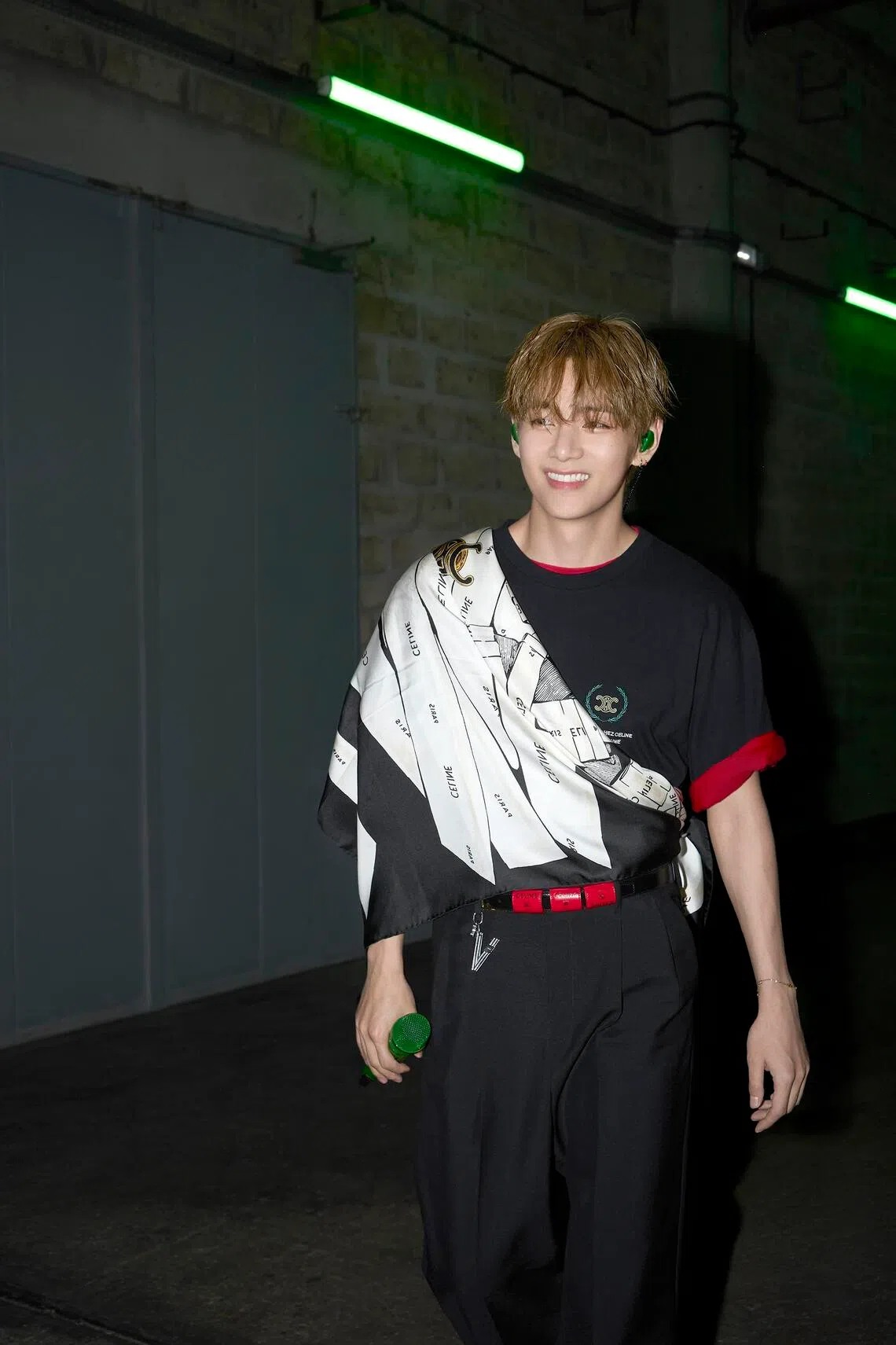 V in a full Celine look, including custom charms.