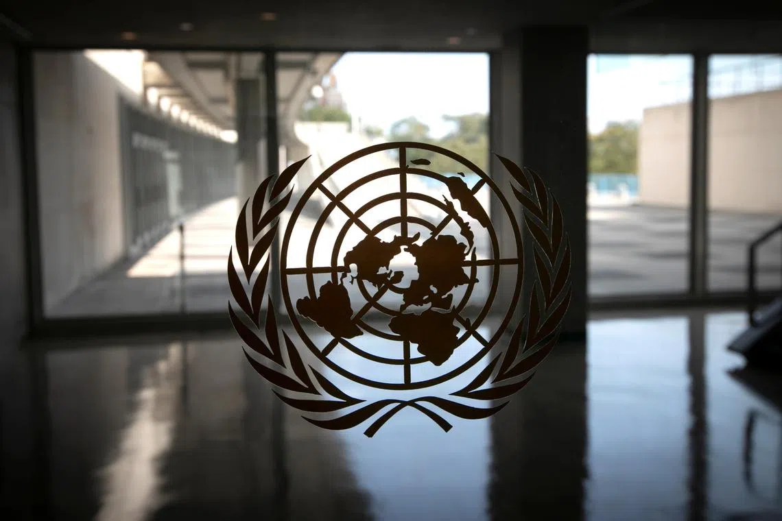 FILE PHOTO: The United Nations logo is seen on a window in New York, U.S., September 21, 2020. REUTERS/Mike Segar/File Photo