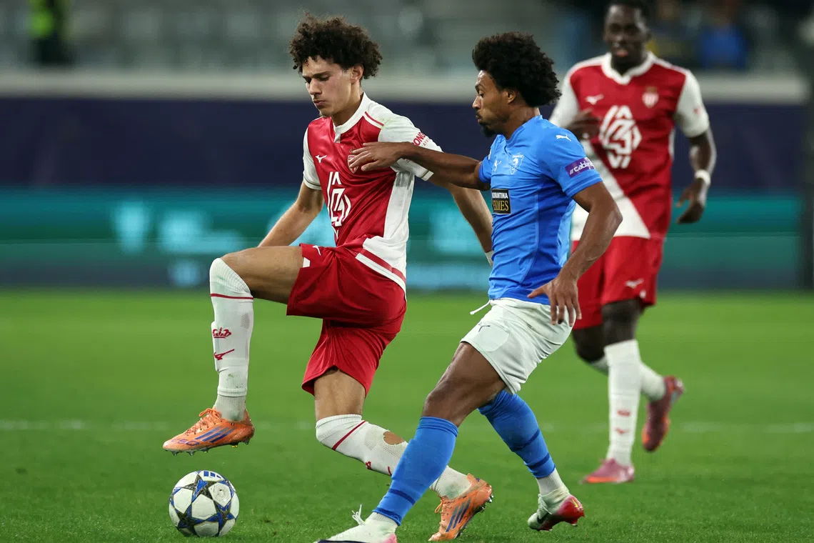 Soccer Football - UEFA Champions League - Pafos v AS Monaco - Alphamega Stadium, Kolossi, Cyprus - November 26, 2025 AS Monaco's Maghnes Akliouche in action with Pafos' Bruno REUTERS/Yiannis Kourtoglou