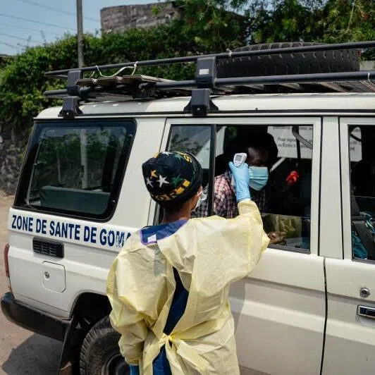 A health worker screening visitors to the  Kyeshero Hospital in Goma in the Democratic Republic of Congo on May 18 as part of Ebola prevention measures.