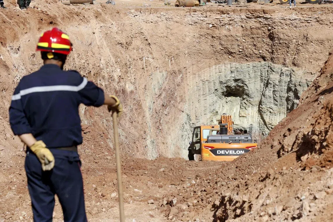 Rescuers working to reach 10-year-old Ayoub on Sept 5, after he fell into an 80m-deep well near his home in Algeria. The traditionally dug well was just 40cm in diameter, making efforts to rescue him difficult.
