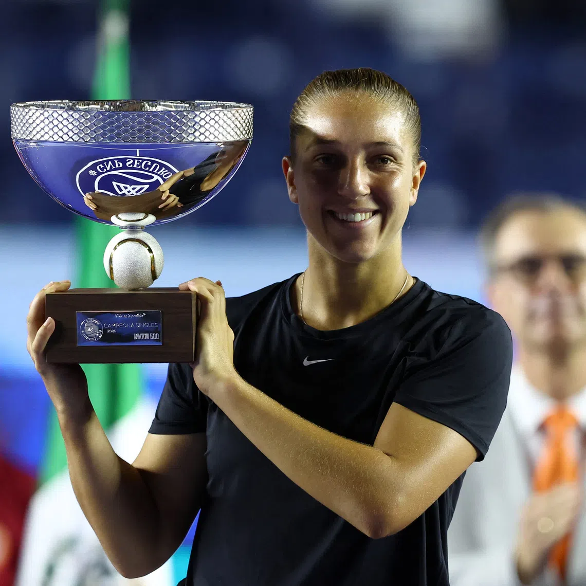 Tennis - WTA 500 - Monterrey Open - Club Sonoma, Monterrey, Mexico - August 29, 2026 France's Diane Parry poses with the trophy after winning her final match against Belgium's Elise Mertens REUTERS/Daniel Becerril