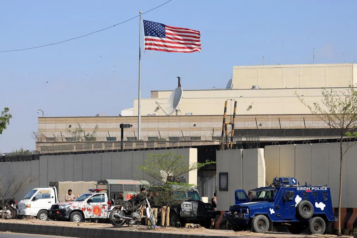 Police and paramilitary soldiers stand guard outside the U.S. Consulate General, days after a protest following the killing of Iran's Supreme Leader Ayatollah Ali Khamenei in U.S. and Israeli strikes on Saturday, in Karachi, Pakistan, March 5, 2026. Picture taken with a mobile phone. REUTERS/Akhtar Soomro