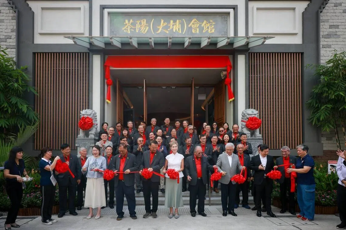 Minister for Digital Development and Information Josephine Teo (in white) at the opening of the Dabu Hakka Building by Char Yong (Dabu) Association on July 3.