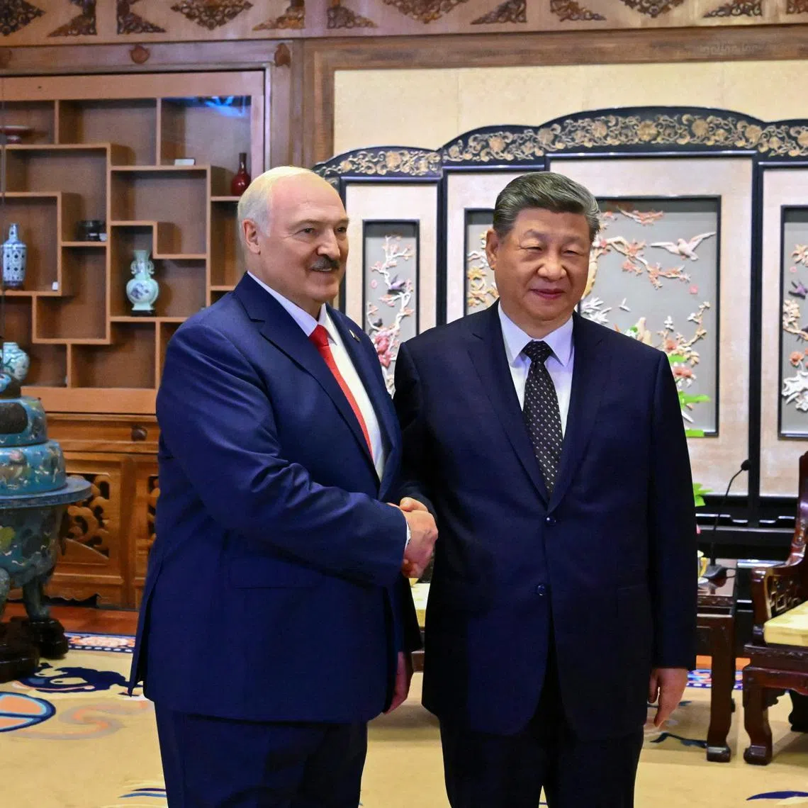 Belarusian President Alexander Lukashenko shakes hands with Chinese President Xi Jinping during a meeting in Beijing, China June 29, 2026. President of the Republic of Belarus/Handout via REUTERS