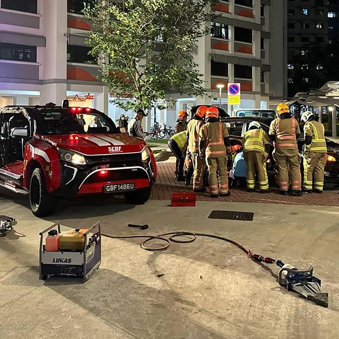 There were more than 10 SCDF officers rescuing the domestic helper.