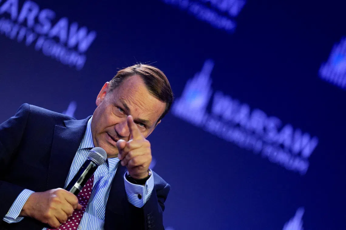 Poland's Foreign Minister Radoslaw Sikorski speaks during the panel discussion 'The Return of Power Politics: Europe Between War and Rivalry' at the 2026 Warsaw Security Forum in Warsaw, Poland, October 13, 2026. REUTERS/Aleksandra Szmigiel