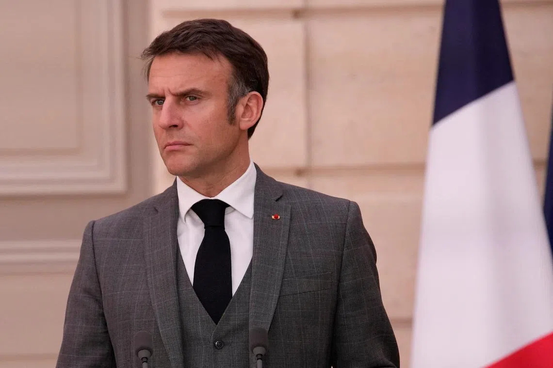 FILE PHOTO: France’s President Emmanuel Macron attend a media conference ahead of a working lunch with Moldova's President Maia Sandu at the Elysee Palace in Paris, France, March 7, 2024. Christophe Ena/Pool via REUTERS/File Photo
