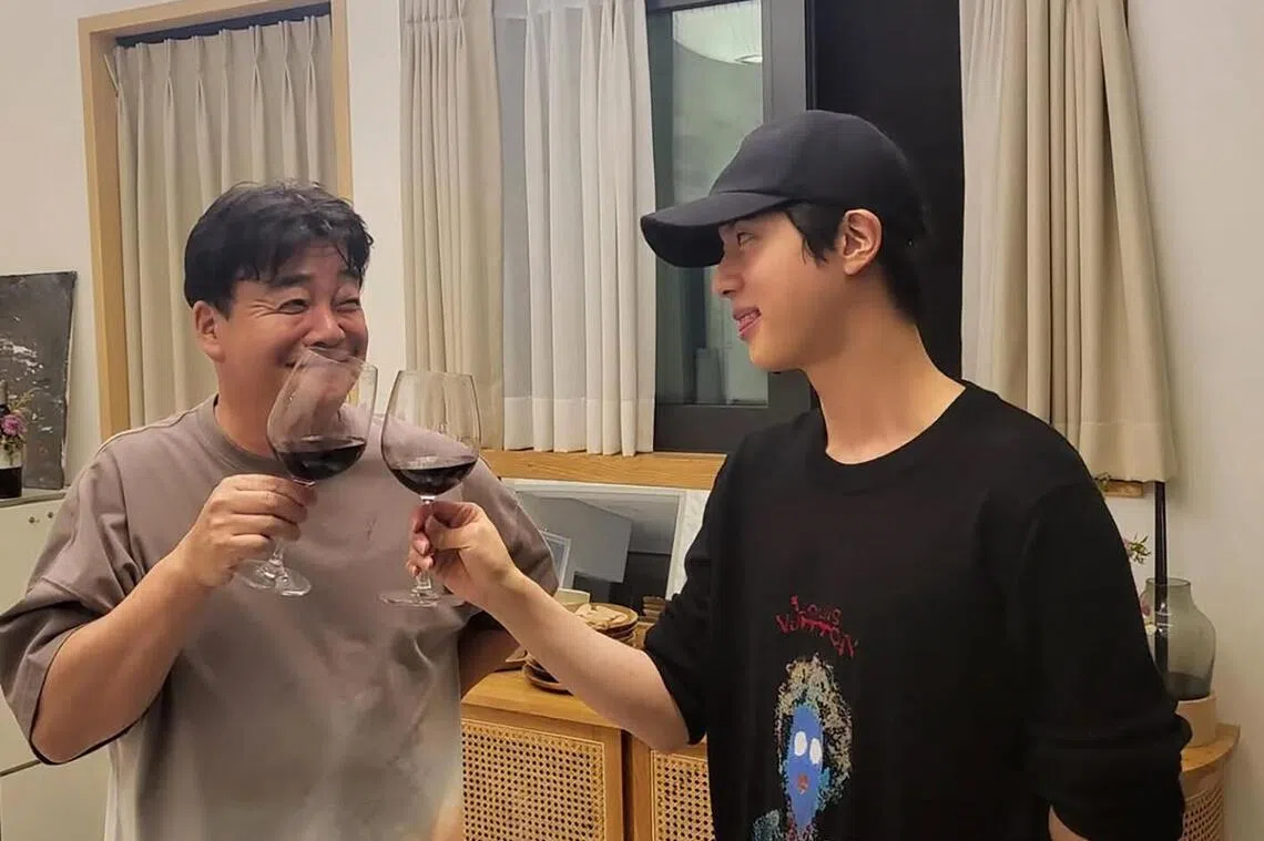 alcohol26 - Screenshot. BTS singer Jin (right) with South Korean food entrepreneur Paik Jong-won in May 2022.

Credit: JIN/INSTAGRAM
