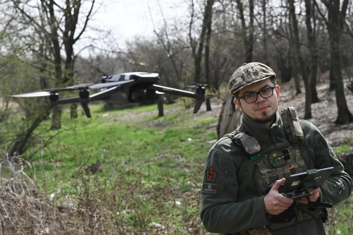 Ukrainian serviceman Oleksandr, 30, a drone pilot of the 5 Separate Assault Brigade, attends a training exercise in the Donetsk region on April 7, 2023, amid the Russian invasion of Ukraine.
