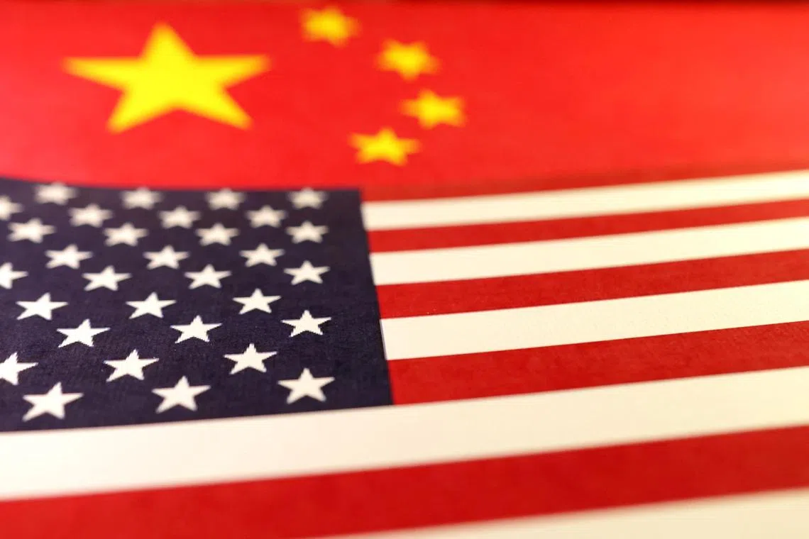 FILE PHOTO: U.S. and Chinese flags are seen in this illustration taken January 8, 2025. REUTERS/Dado Ruvic/Illustration/File photo