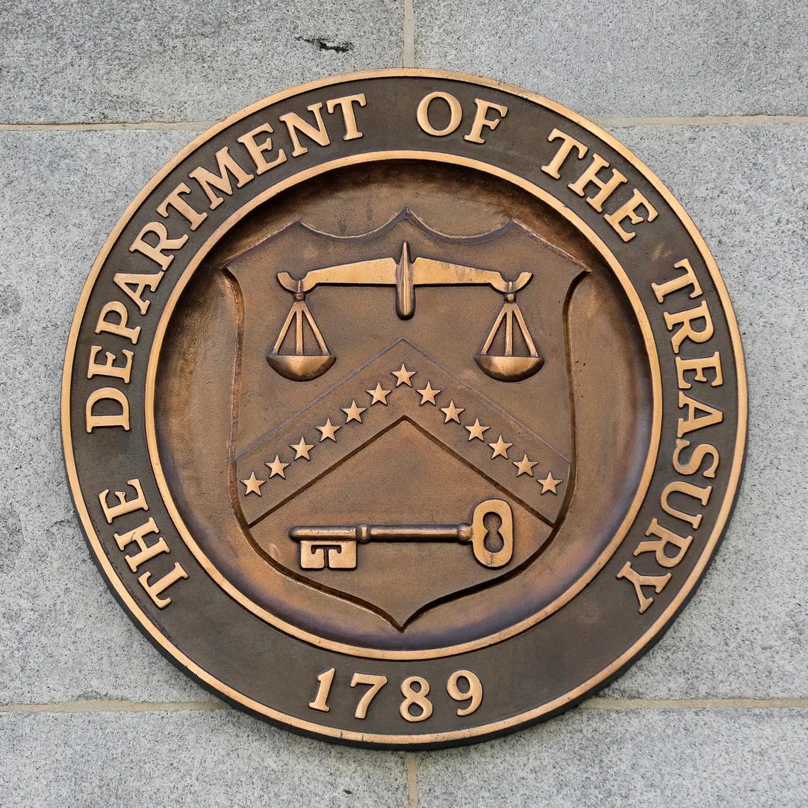 FILE PHOTO: Signage is seen at the United States Department of the Treasury headquarters in Washington, D.C., U.S., August 29, 2020. REUTERS/Andrew Kelly/File Photo