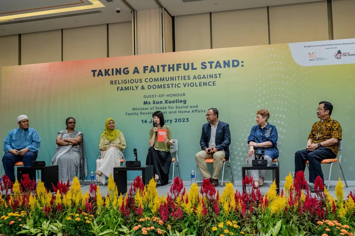 Minister of State for Social and Family Development Sun Xueling (centre) and representatives of various faiths at a panel discussion on how religious organisations can identify and help victims of family violence.