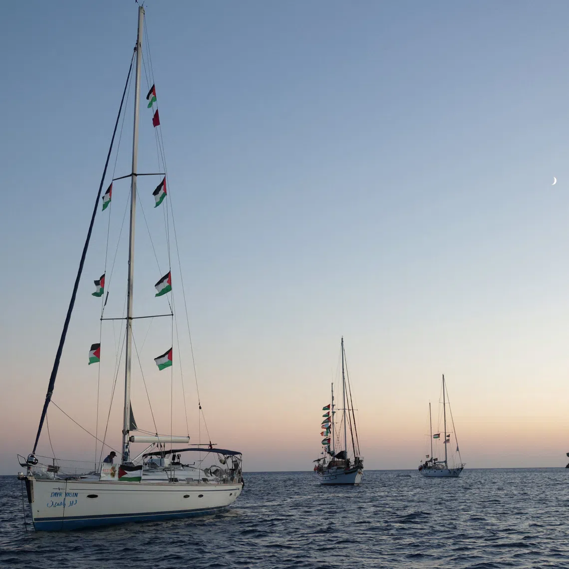 Sailing boats, part of the Global Sumud Flotilla aiming to reach Gaza and break Israel's naval blockade, sail off  Koufonisi islet, Greece, September 26, 2025. REUTERS/Stefanos Rapanis