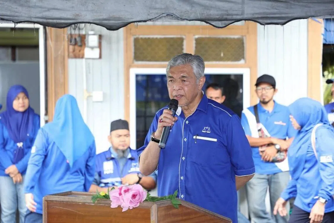 Umno leader Zahid Hamidi won by a razor-thin 348-vote majority in Bagan Datuk, a seat he has held since 1995.