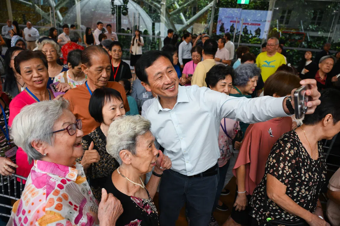 Health Minister Ong Ye Kung taking a wefie at the DBS Foundation X Thye Hua Kwan Moral Charities partnership launch event on Oct 13.
