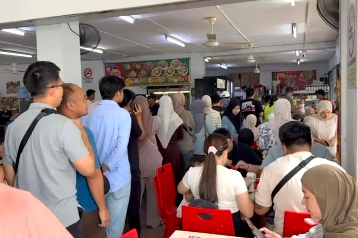 Locals queueing at 126 Laksa, a popular eatery in Kuching, Sarawak on Aug 16.