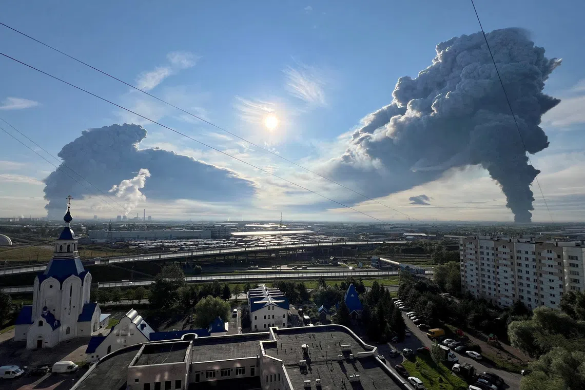 Smoke billows from the burning Wildberries warehouses following a Ukrainian drone attack, according to local authorities, in Saint Petersburg, on July 24.