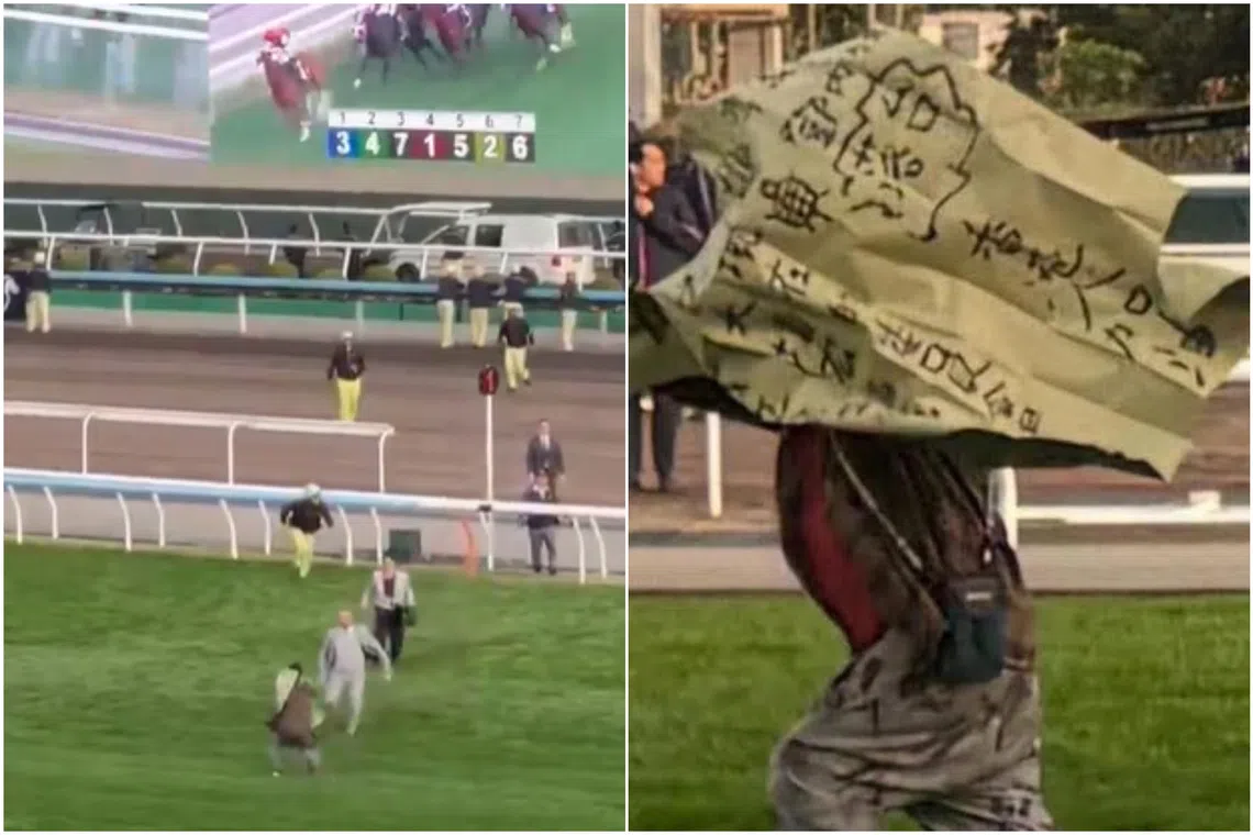 The man was prevented by racecourse staff from getting into the path of the horses thundering past, which could have caused carnage.